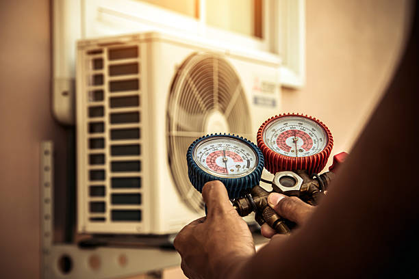 Professional Hvac technician working in Middle Island, NY
